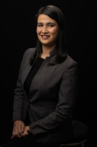 The PBC Membership Director wearing a business suit.